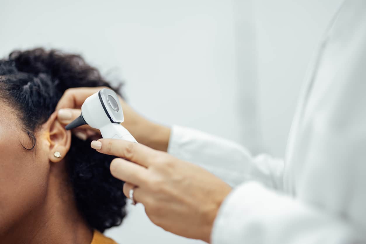 Woman gets ear examined