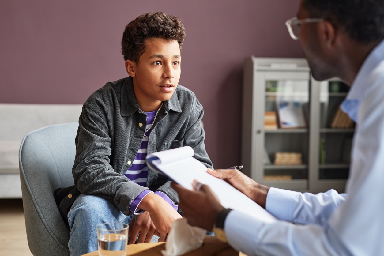 Teenager in speech therapy.